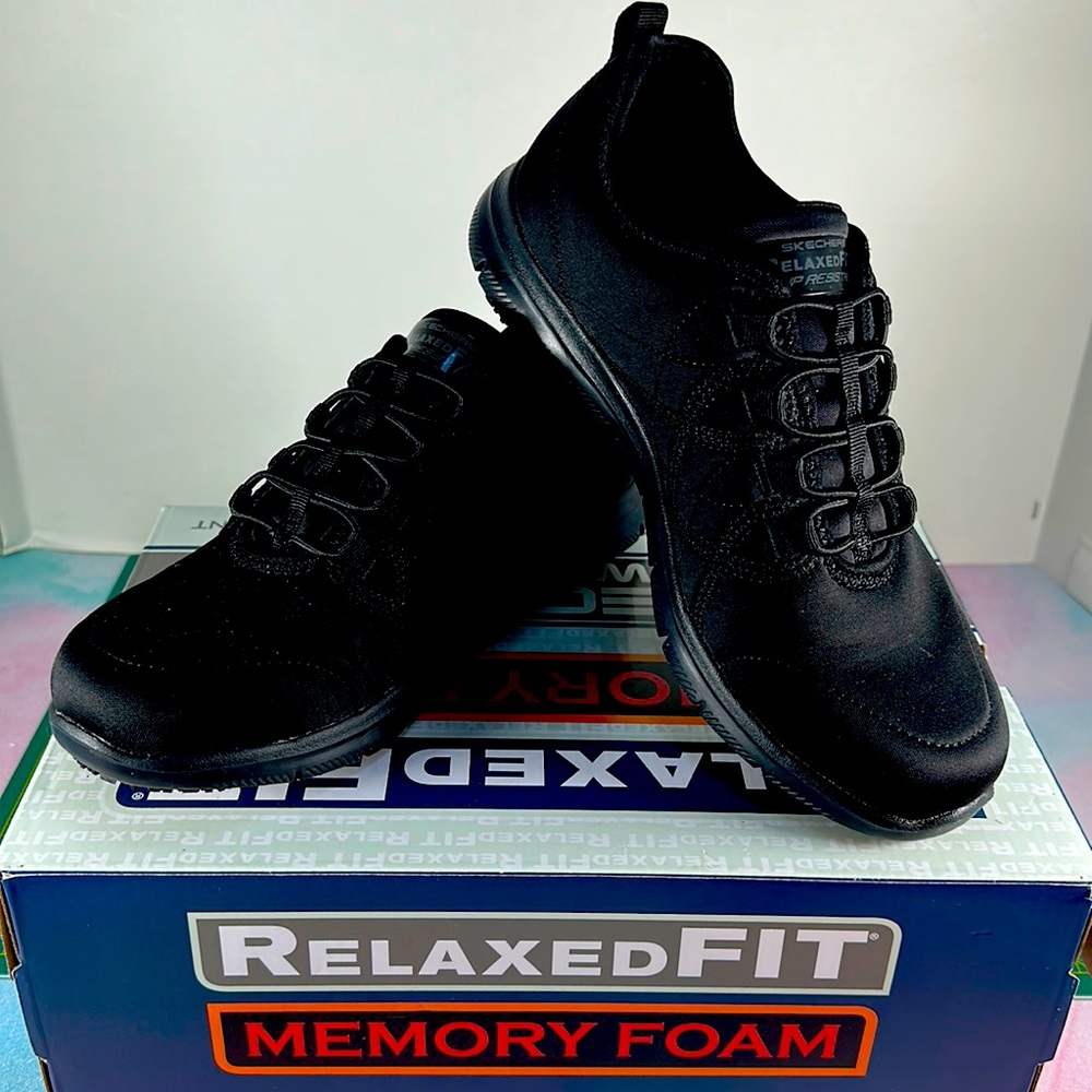 Women’s Skechers relaxed fit, slip resistant black shoes